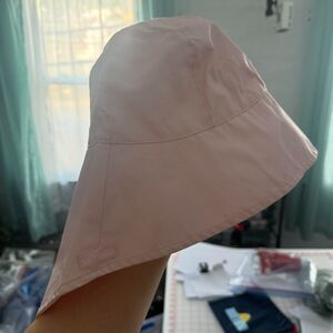 Kangol - Hat that protects the neck with secret pocket light pink